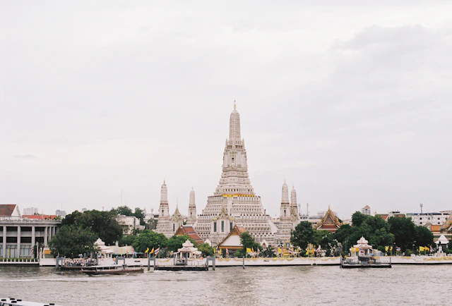 Wat Arun overlooking the Chao Phraya River in Bangkok, Thailand