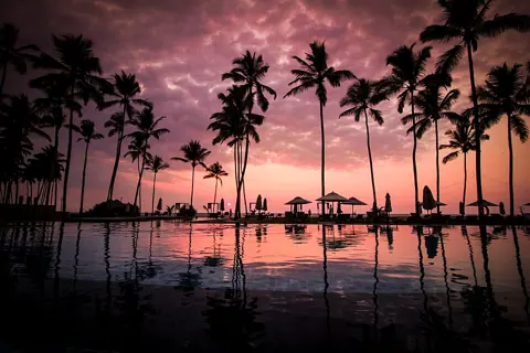 Negombo, Sri Lanka — Negombo Beach resort pool (Unsplash)