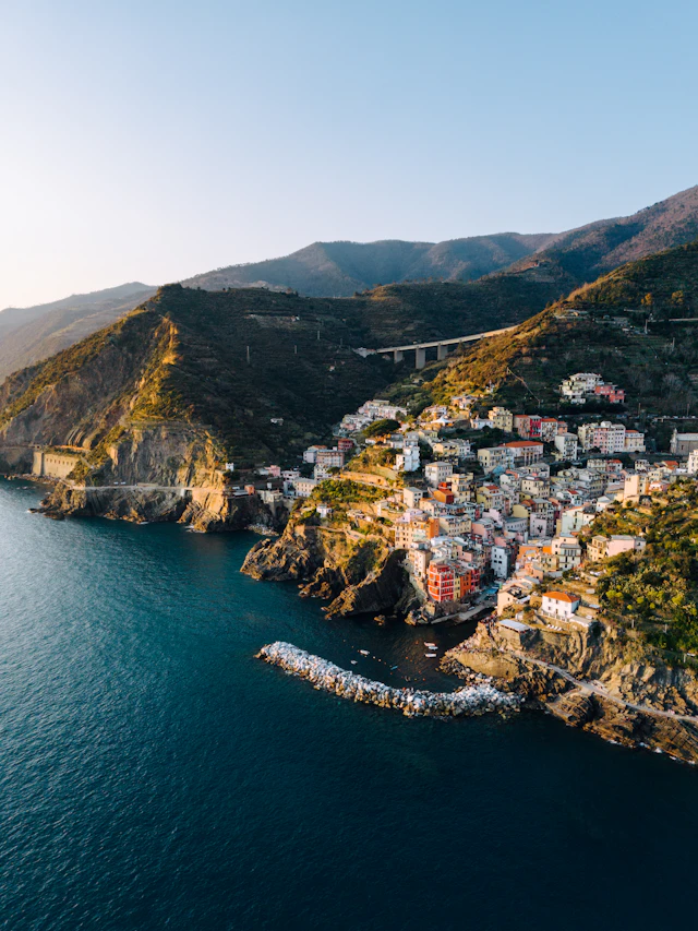 Riomaggiore's colorful houses overlooking the sea in Cinque Terre, Italy